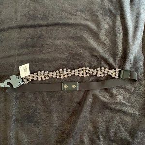 Fashion belt 32” unstretched. I think it is reversible.